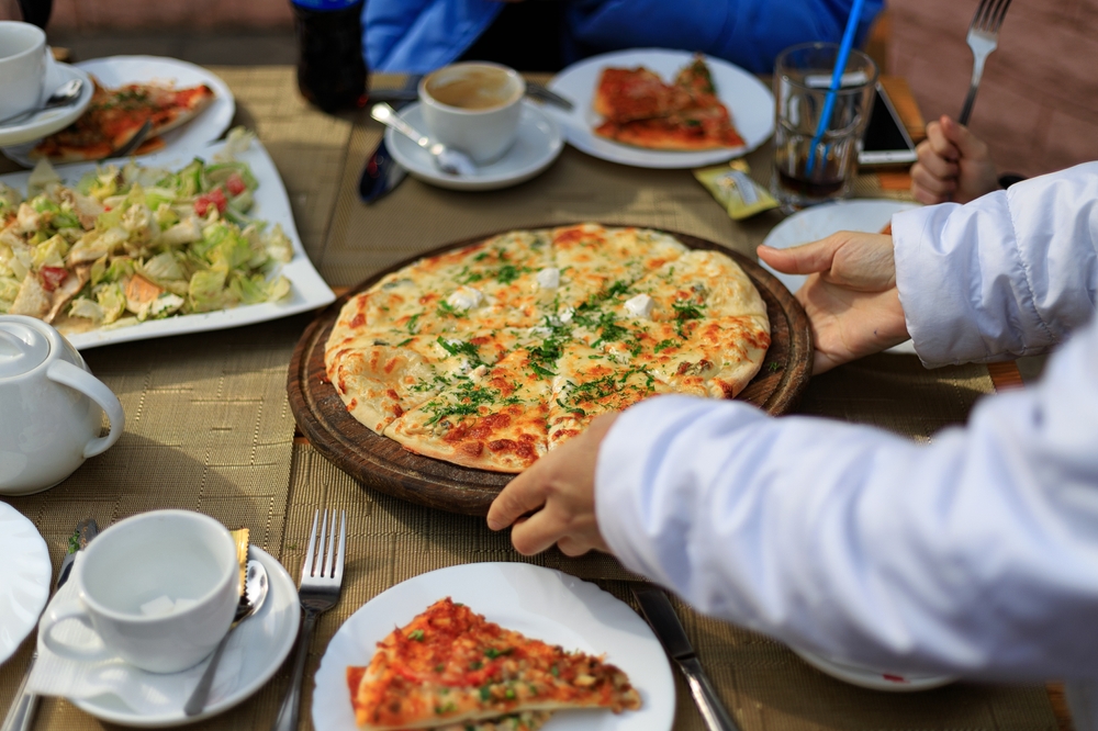 Top Italian Restaurants in Rock Hill SC - Pizza Served by Restaurant Waiter
