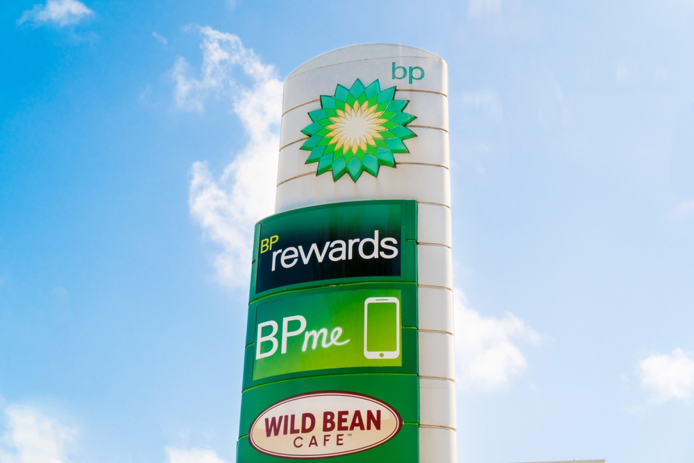 BP gas station sign with cash back rewards on display