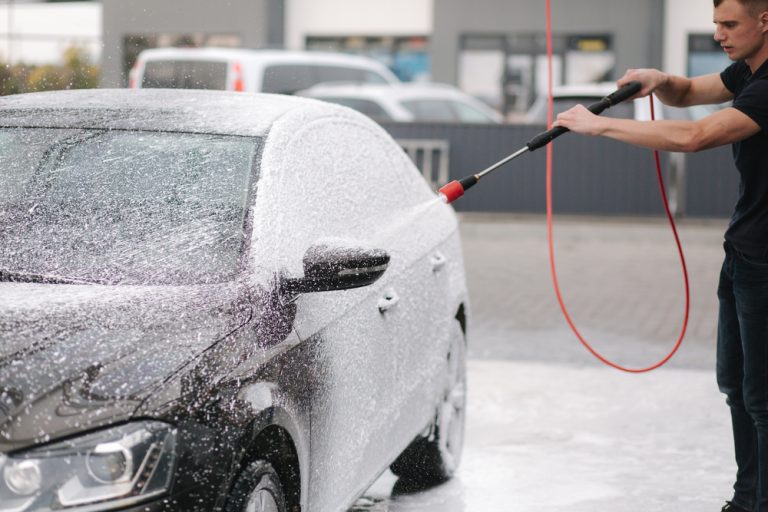 A man washing his car