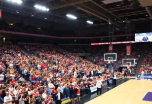 Crowd of fans at a Winthrop University basketball game with banners and team colors.