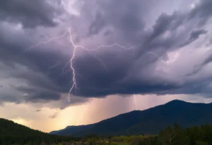 Dark storm clouds and lightning over a mountainous landscape