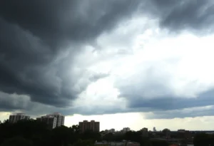 Dark storm clouds gathering over Columbia city skyline