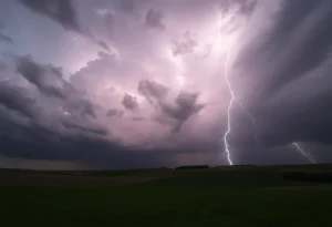 Dark storm clouds over South Carolina with lightning strikes