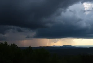 Dark storm clouds gather over the Oconee Mountains with lightning flashes.