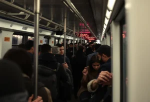 Crowded urban light rail train representing public safety concerns
