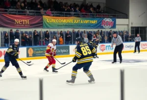 Firefighters and police officers playing ice hockey at the Battle of the Badges event.