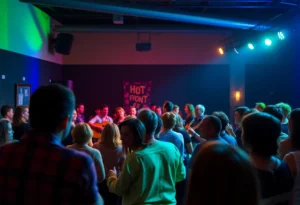 Audience enjoying a concert performance by Le Vent du Nord at BOMBYX Center.