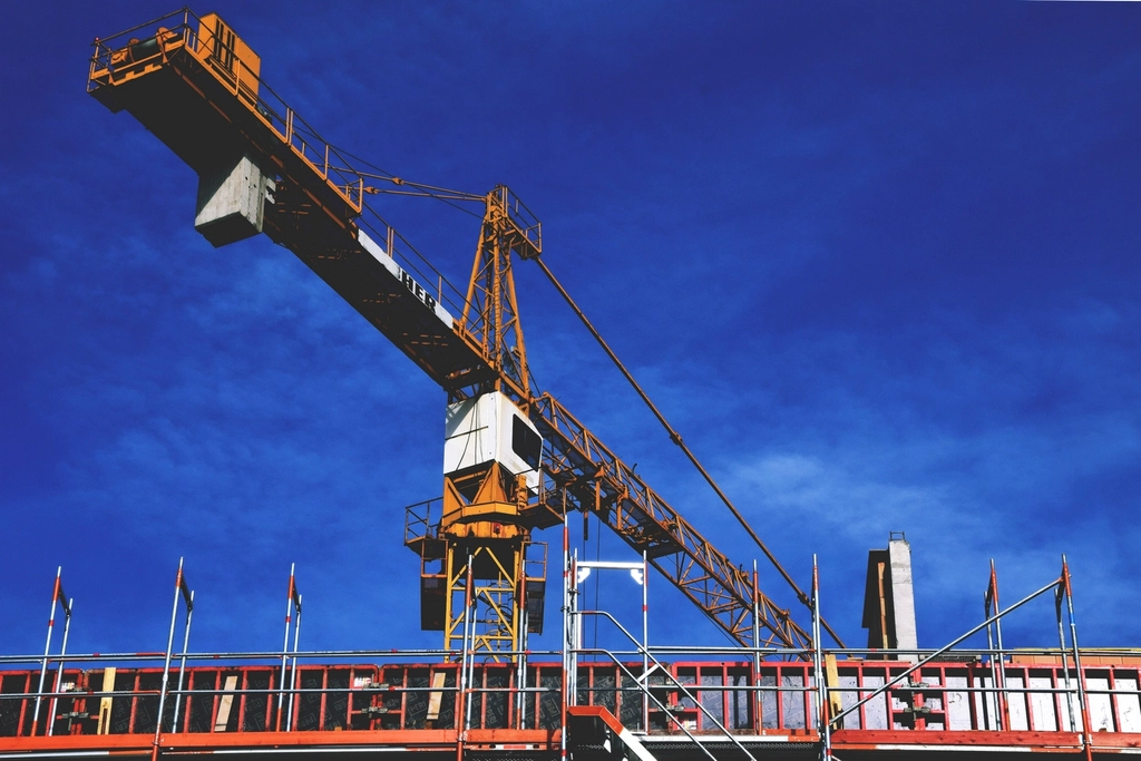 Construction crane over a building site